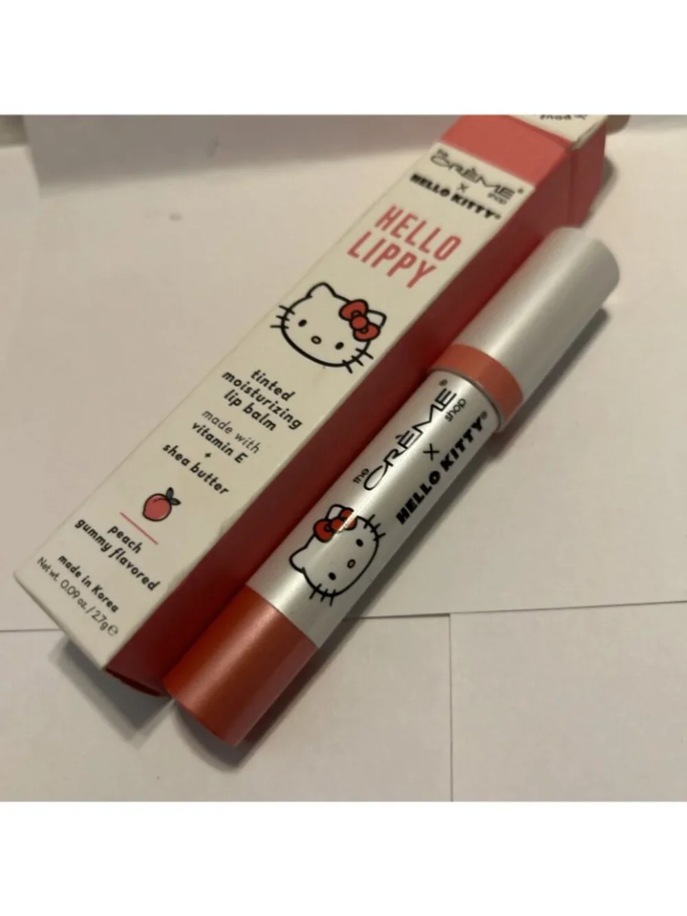 The Crème Shop Hello Kitty & Friends Tinted Peach Moisture Lip Balm Stick .09oz